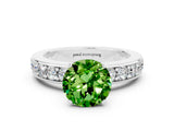 White gold Round Cut Cut Channel Set Diamond Engagement Ring with Four-Prong Setting