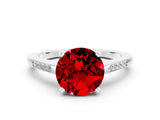 White gold Round Cut Cut Channel Set Solitaire Engagement Ring with Four-Prong Setting