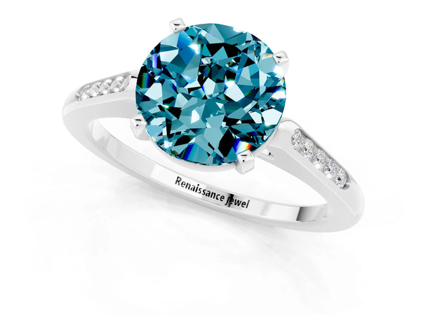 White gold Round Cut Blue Topaz Solitaire Ring with Channel Set Round Band and Prong Setting
