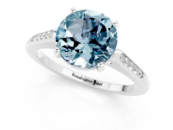 White gold Round Cut Aquamarine Solitaire Ring with Channel Set Round Band and Prong Setting