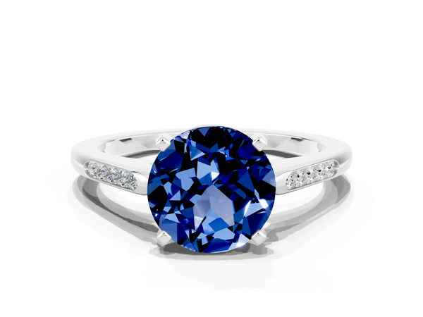White gold Round Cut Blue Sapphire Solitaire Ring with Channel Set Round Band and Prong Setting