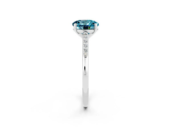 Silver Round Cut Blue Topaz Solitaire Ring with Channel Set Round Band and Prong Setting