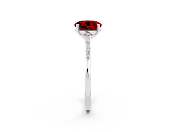 Silver Round Cut Ruby Solitaire Ring with Channel Set Round Band and Prong Setting