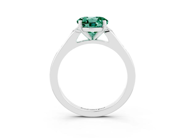 Platinum Round Cut Green Sapphire Solitaire Ring with Channel Set Round Band and Prong Setting