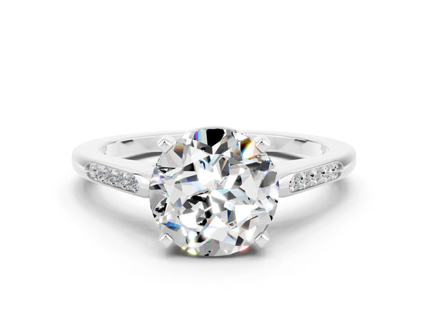 Platinum Round Cut Moissanite Solitaire Ring with Channel Set Round Band and Prong Setting