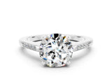 White gold Round Cut Cut Channel Set Solitaire Engagement Ring with Four-Prong Setting