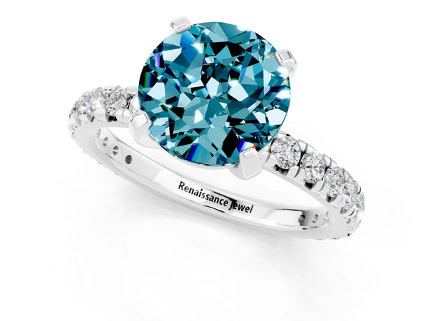 Platinum Round Cut Cut Diamond Pavé Band with Four-Prong Setting