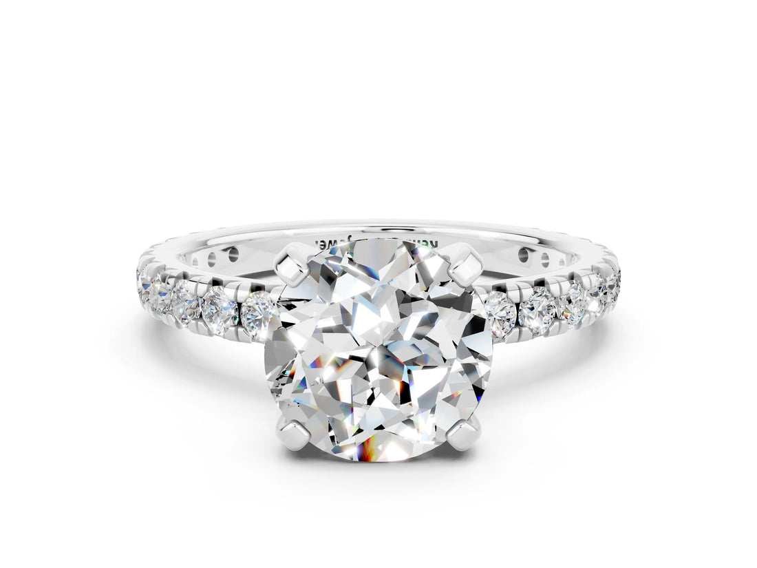 White gold Round Cut Cut Diamond Pavé Band with Four-Prong Setting