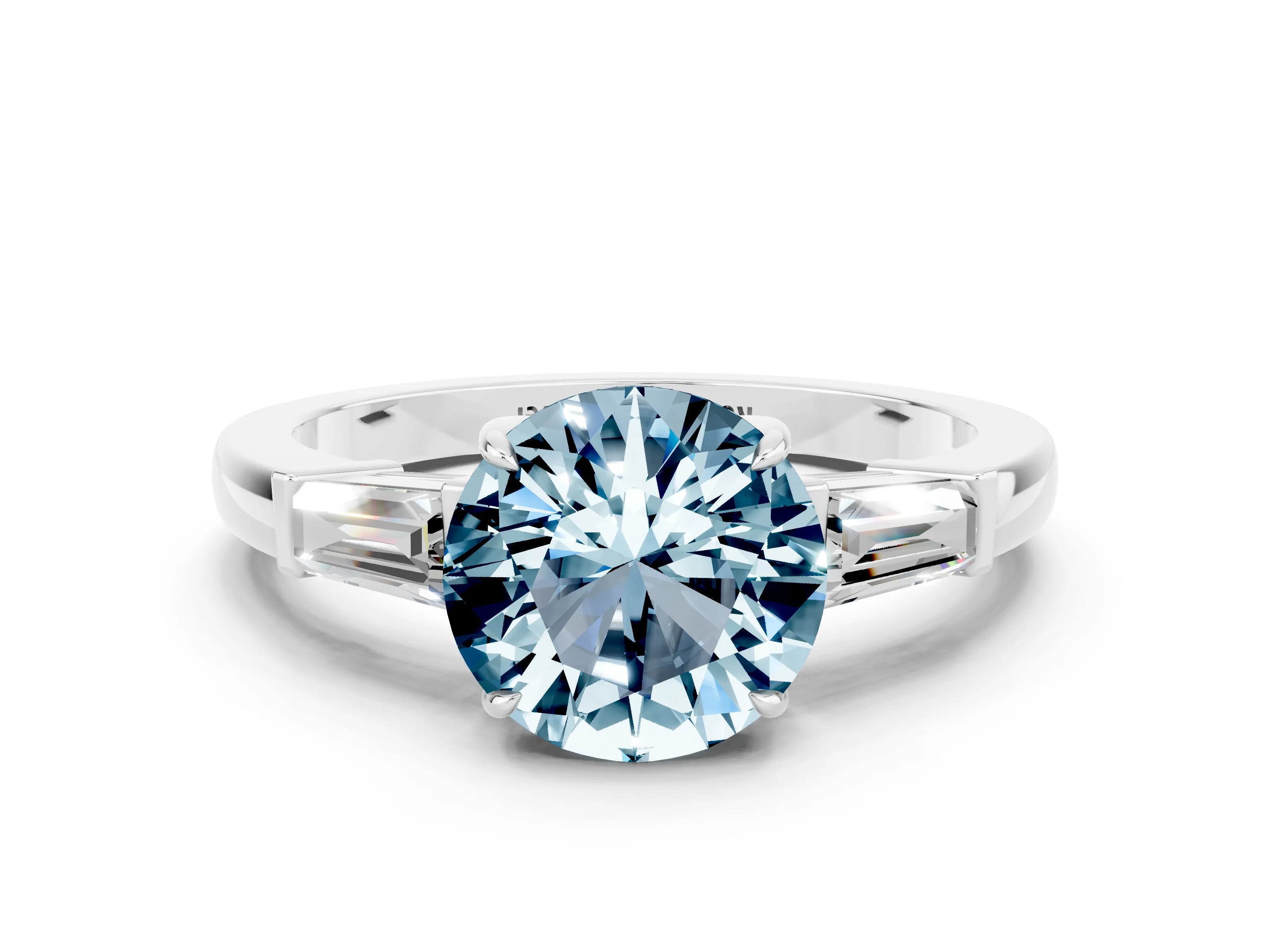 White gold Round Cut Cut Diamond Ring with Tapered Baguette Side Stones in Four-Prong Setting