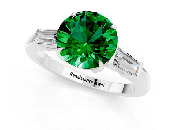 White gold Round Cut Emerald Three-Stone Ring with Tapered Baguette Side Stones and Prong Setting