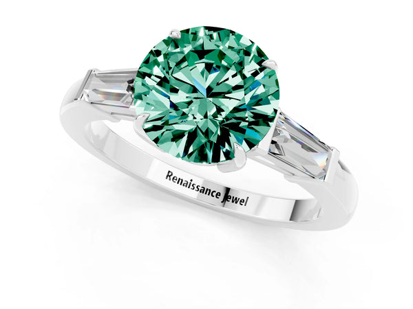 Platinum Round Cut Green Sapphire Three-Stone Ring with Tapered Baguette Side Stones and Prong Setting