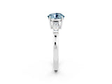 White gold Round Cut Cut Diamond Ring with Tapered Baguette Side Stones in Four-Prong Setting_2