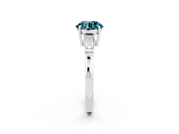 Platinum Round Cut Cut Diamond Ring with Tapered Baguette Side Stones in Four-Prong Setting