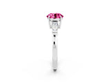 White gold Round Cut Cut Diamond Ring with Tapered Baguette Side Stones in Four-Prong Setting_2