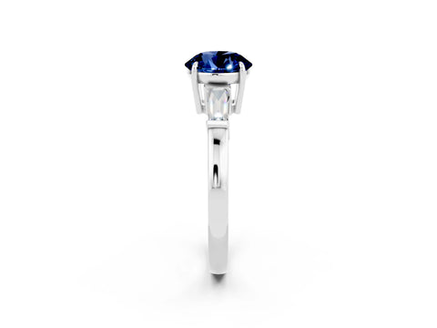White gold Round Cut Cut Diamond Ring with Tapered Baguette Side Stones in Four-Prong Setting_2