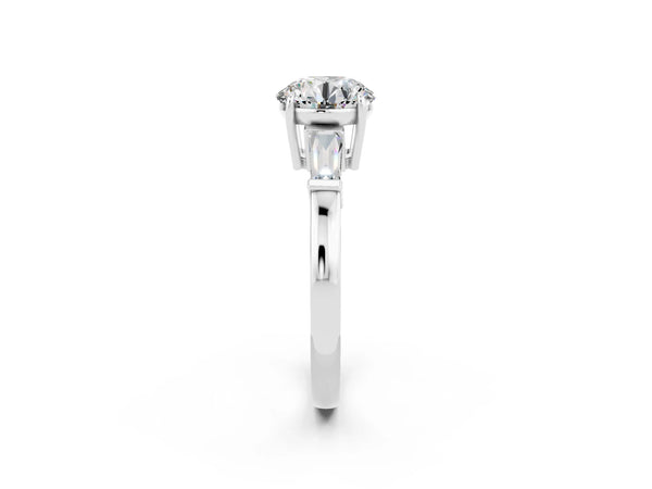 White gold Round Cut Moissanite Three-Stone Ring with Tapered Baguette Side Stones and Prong Setting