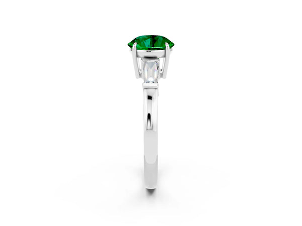 Silver Round Cut Emerald Three-Stone Ring with Tapered Baguette Side Stones and Prong Setting