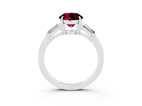 Platinum Round Cut Garnet Three-Stone Ring with Tapered Baguette Side Stones and Prong Setting