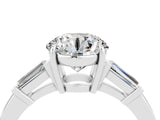 White gold Round Cut Cut Diamond Ring with Tapered Baguette Side Stones in Four-Prong Setting_4