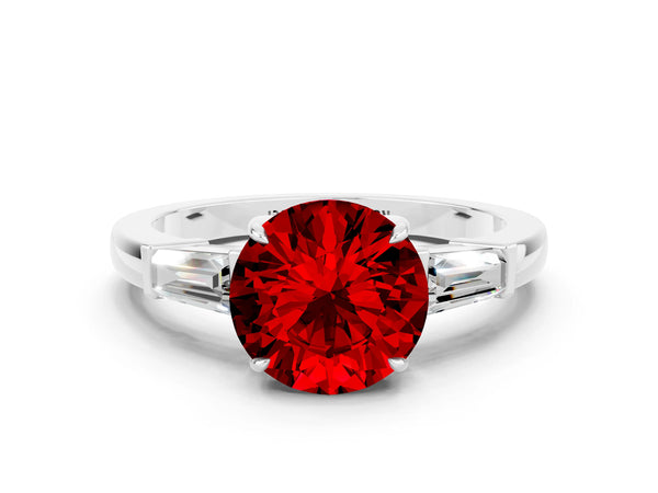 Silver Round Cut Cut Diamond Ring with Tapered Baguette Side Stones in Four-Prong Setting