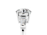 White gold Round Cut Cut Diamond Ring with Tapered Baguette Side Stones in Four-Prong Setting_5