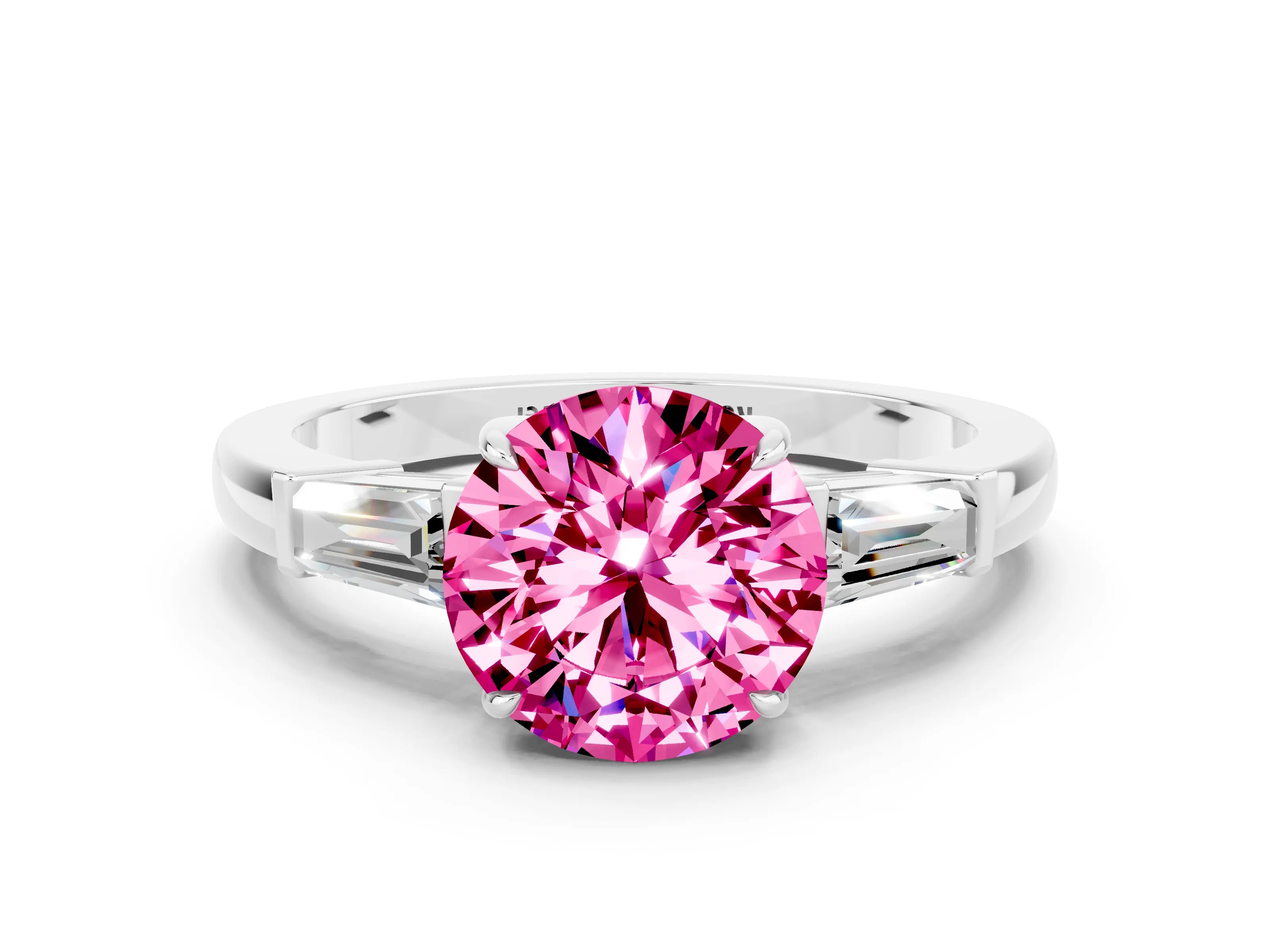 White gold Round Cut Cut Diamond Ring with Tapered Baguette Side Stones in Four-Prong Setting