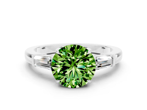 White gold Round Cut Cut Diamond Ring with Tapered Baguette Side Stones in Four-Prong Setting