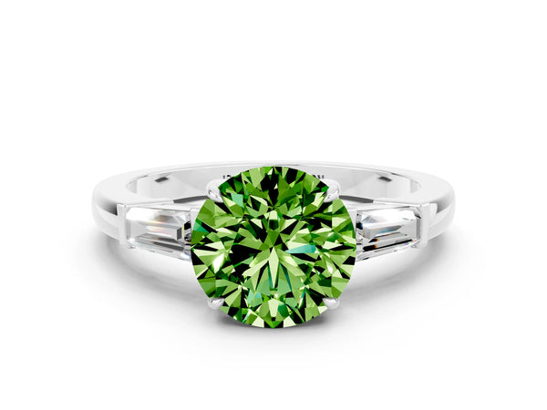 Platinum Round Cut Cut Diamond Ring with Tapered Baguette Side Stones in Four-Prong Setting