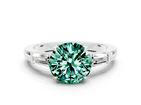 White gold Round Cut Cut Diamond Ring with Tapered Baguette Side Stones in Four-Prong Setting