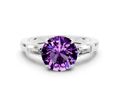 White gold Round Cut Cut Diamond Ring with Tapered Baguette Side Stones in Four-Prong Setting
