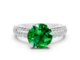 White gold Round Cut Cut Pave Diamond Engagement Ring with Channel Set Band and Four-Prong Setting