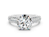 White gold Round Cut Cut Pave Diamond Engagement Ring with Channel Set Band and Four-Prong Setting