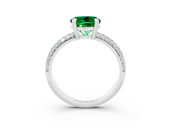 Silver Round Cut Emerald Solitaire Ring with Multi-Row Round Pavé Band and Prong Setting