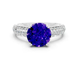 White gold Round Cut Cut Pave Diamond Engagement Ring with Channel Set Band and Four-Prong Setting