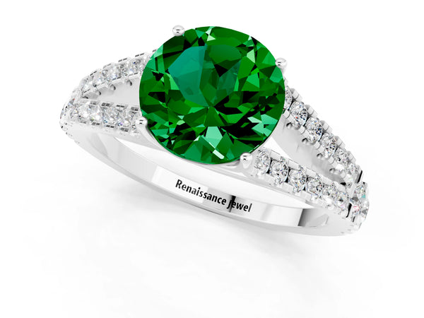Platinum Round Cut Emerald Split Shank Engagement Ring with Round Pavé and Prong Setting