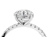 White gold Round Cut Diamond Brilliant Solitaire Ring with Pavé Band and Four-Prong Setting_174