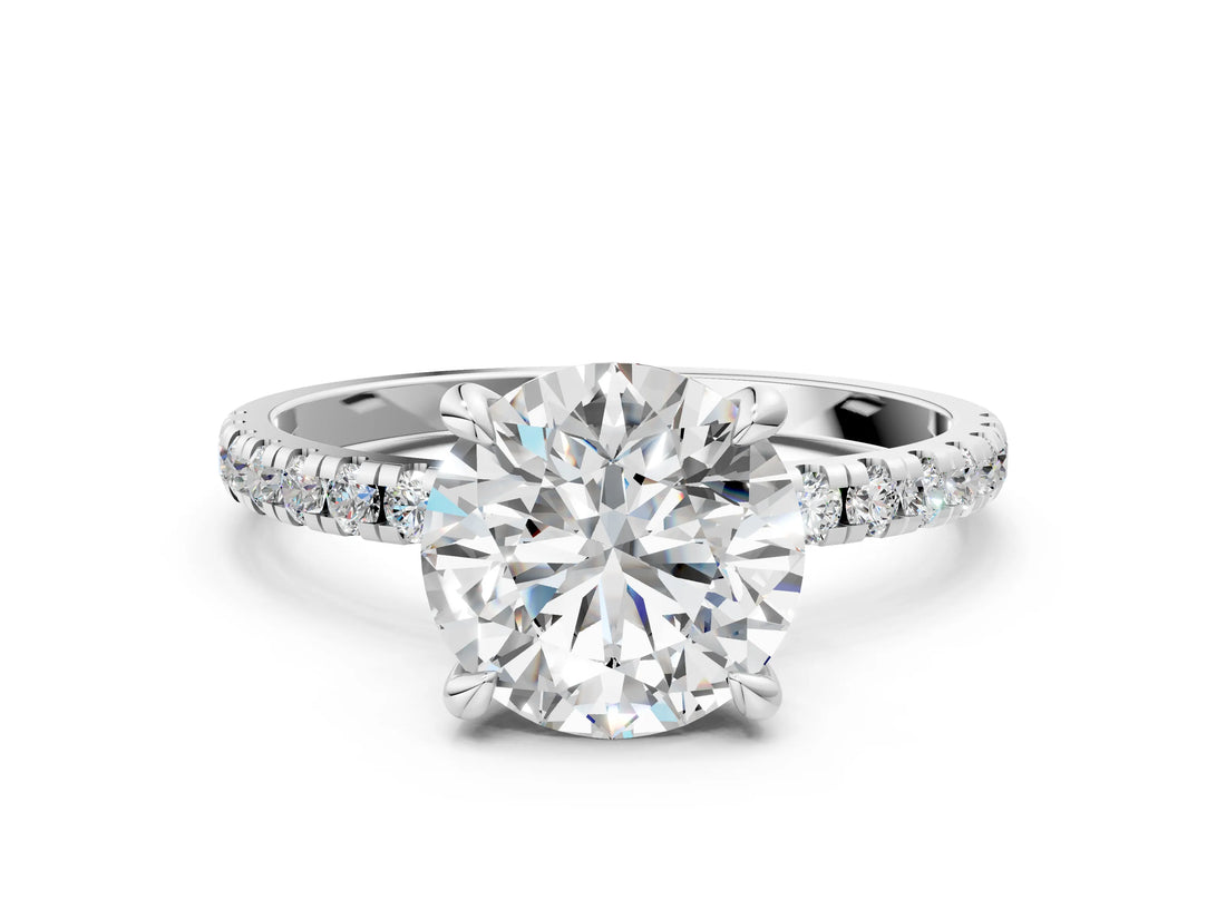 White gold Round Cut Diamond Brilliant Solitaire Ring with Pavé Band and Four-Prong Setting_329