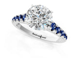 White gold Round Cut Diamond Cathedral Solitaire Ring with Round with Blue Sapphire side stone Pavé Band_1