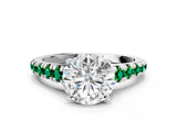 White gold Round Cut Diamond Cathedral Solitaire Ring with Round with Emerald side stone Pavé Band