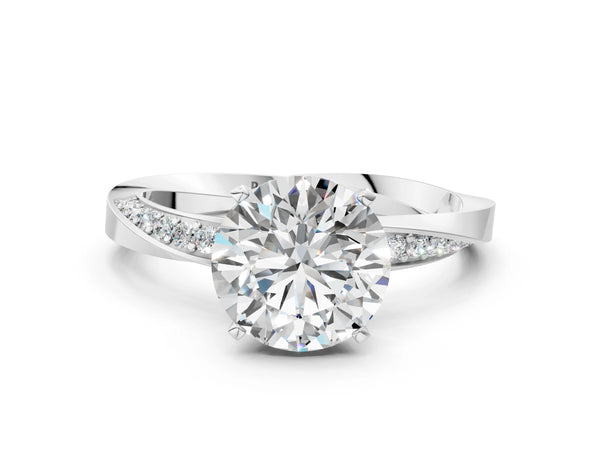 White gold Round Cut Diamond Engagement Ring with Side Stone Accents and Four-Prong Setting