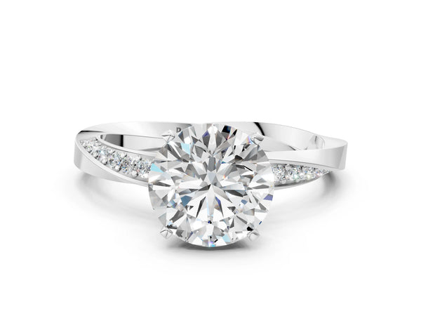 White gold Round Cut Diamond Engagement Ring with Side Stone Accents and Four-Prong Setting