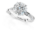 White gold Round Cut Diamond Engagement Ring with Side Stone Accents and Four-Prong Setting_81