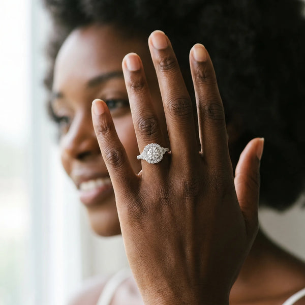 White gold Round Cut Diamond Halo Ring with Pavé Band and Four-Prong Setting