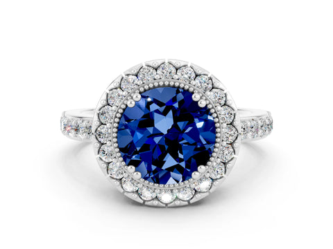 White gold Round Cut Diamond Halo Ring with Pavé Band and Prong Setting