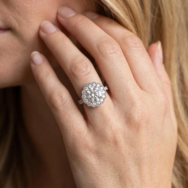 White gold Round Cut Diamond Milgrain Floral Halo Engagement Ring with Pavé Band