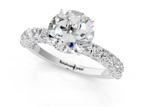 White gold Round Cut Diamond Pavé Band Solitaire Ring with Prong Setting