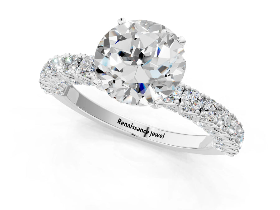 White gold Round Cut Diamond Pavé Band Solitaire Ring with Prong Setting
