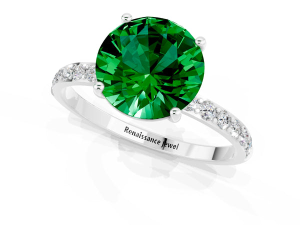 Platinum Round Cut Emerald Solitaire Ring with Round Pavé Shoulders and Prong Setting