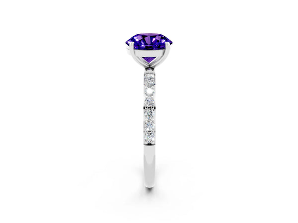 Platinum Round Cut Tanzanite Solitaire Ring with Round Pavé Shoulders and Prong Setting