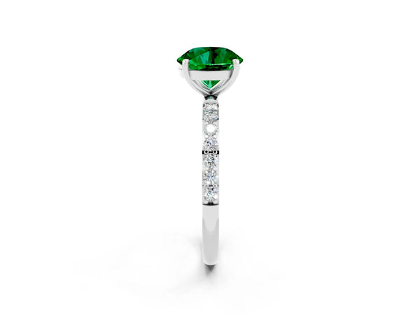 Platinum Round Cut Emerald Solitaire Ring with Round Pavé Shoulders and Prong Setting